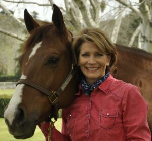 Debbie Loucks with the family's horse, Bunny, which is short for Steel Buns - photo by James Oliver