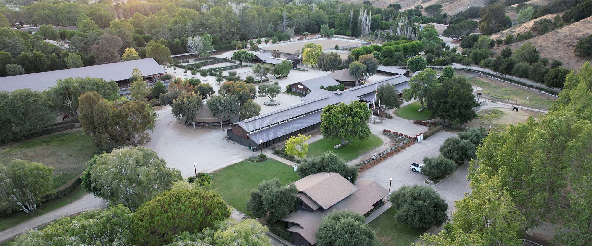 Debbie Loucks leading a full ranch tour at the California Horse Center in Solvang, California, sharing horsemanship history and training philosophy.