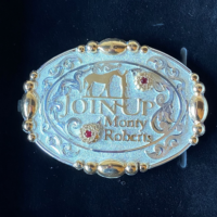 BELT BUCKLE (SMALL): MONTY ROBERTS® LOGO